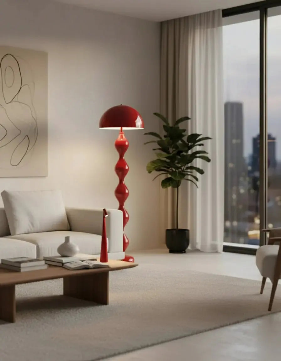 Lampe sans fil rechargeable de couleur rouge dans un salon par korven studio 